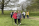 People walking through a park