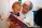 Grandma reading to child