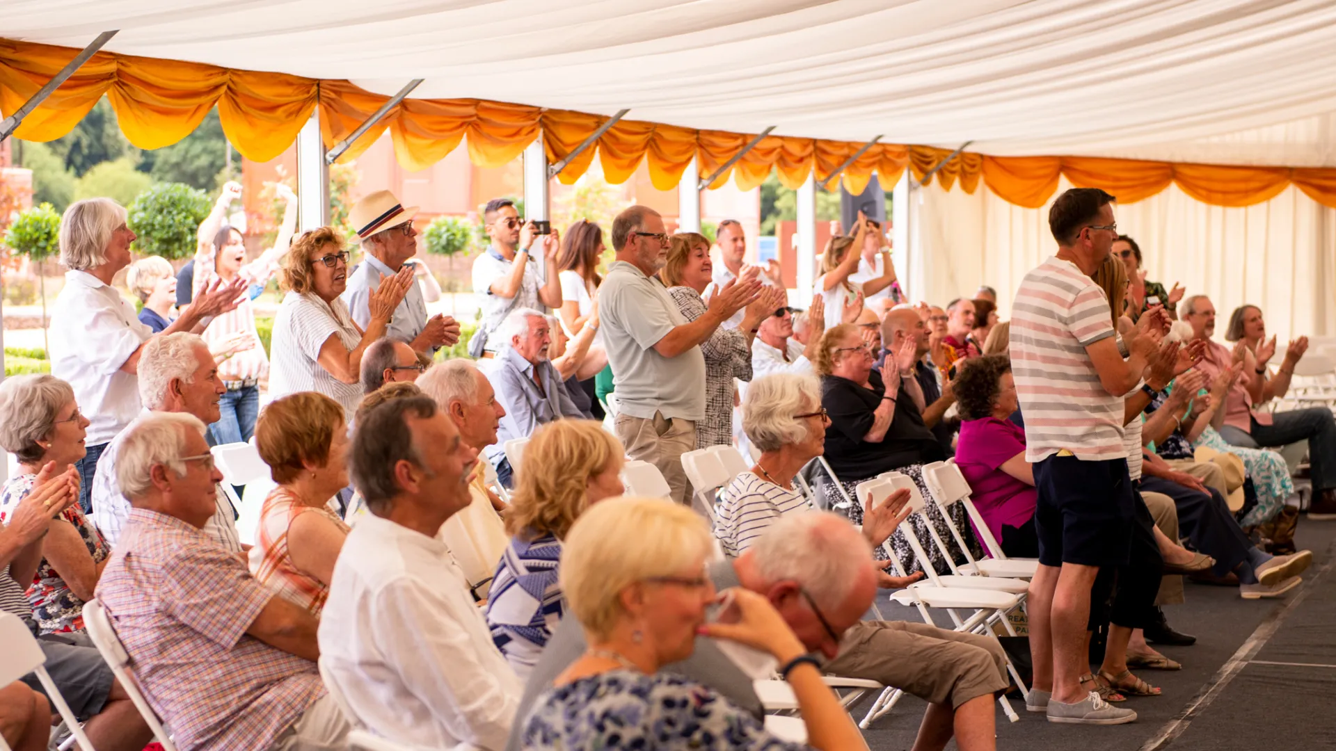 Performers receive a standing ovation from the crowd