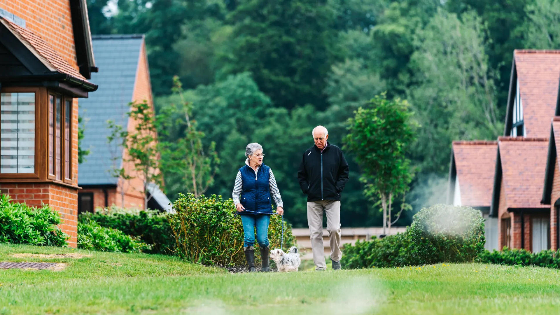 A couple walking at Great Alne Park