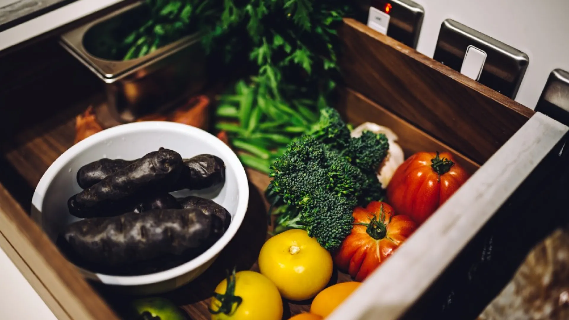 Different types of veg in a sink
