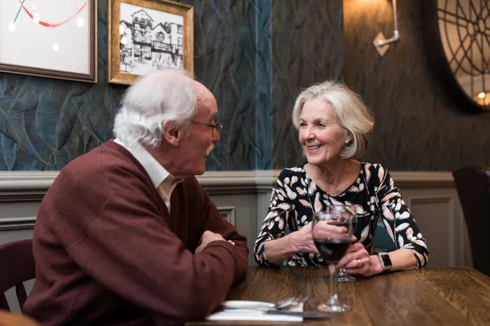Man and women having a meal