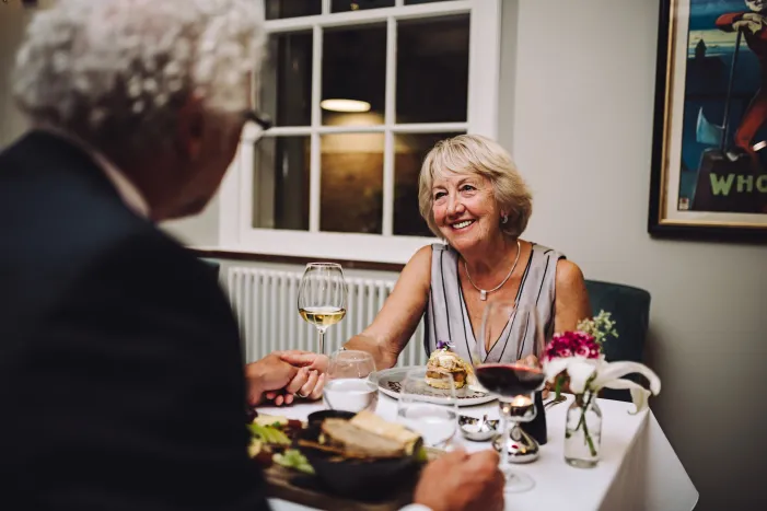 Man and women having a meal