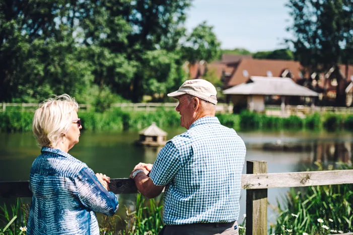 A man and women stood around Durrants lake