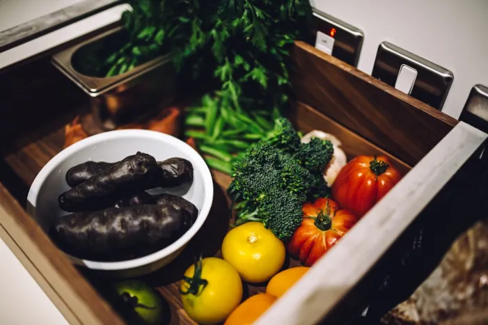 Different types of veg in a sink