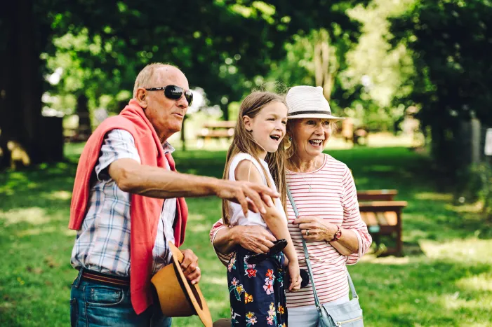 Grandparents with their grandchildren outdoors