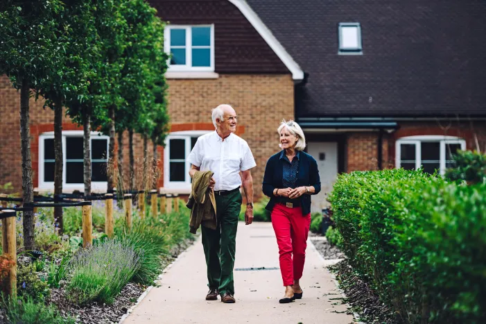 Two people walking in an inspired retirement village